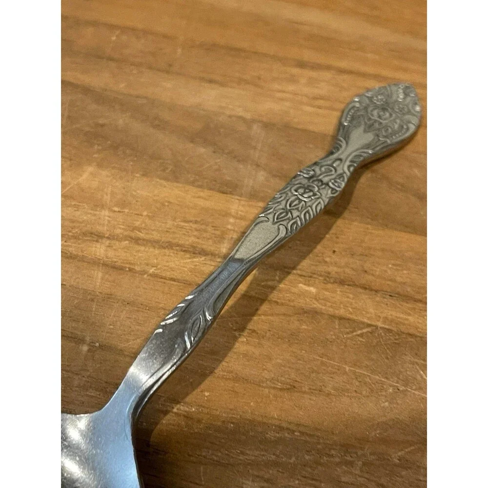 Orleans silver stainless serving spoon